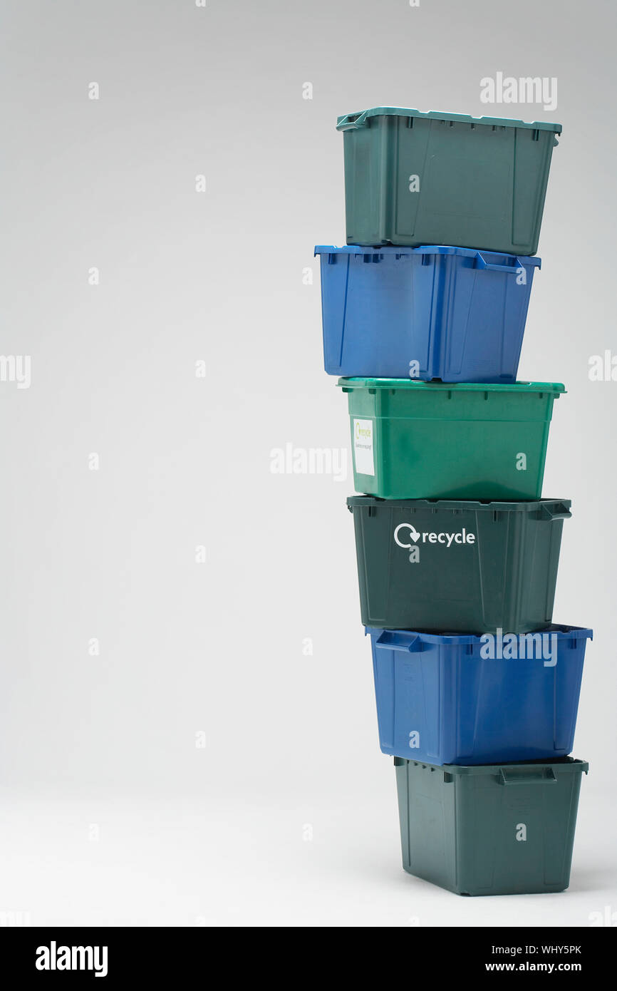 Stack of plastic crates isolated over white background Stock Photo - Alamy