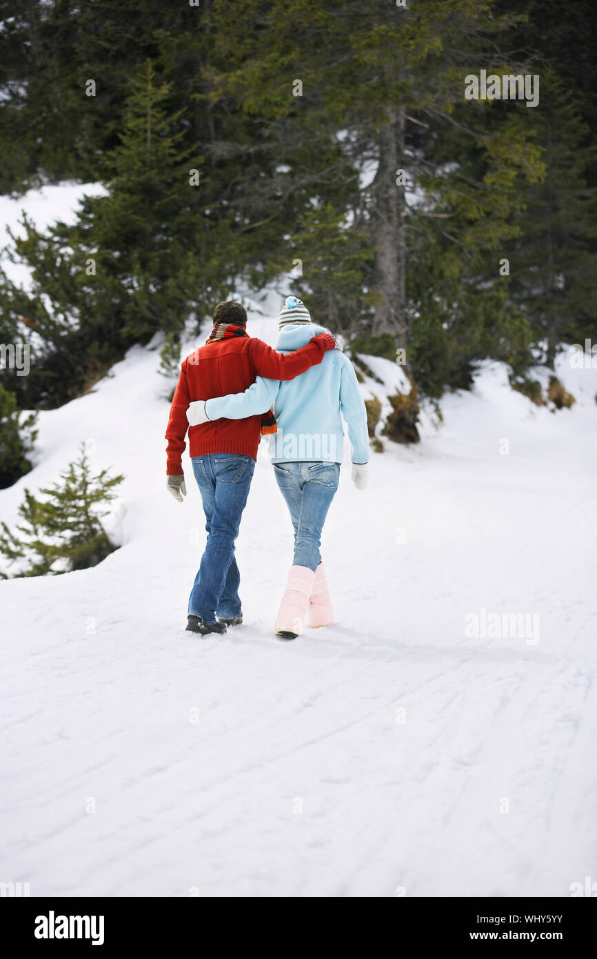 Romantic couple snow rear view hi-res stock photography and images - Alamy