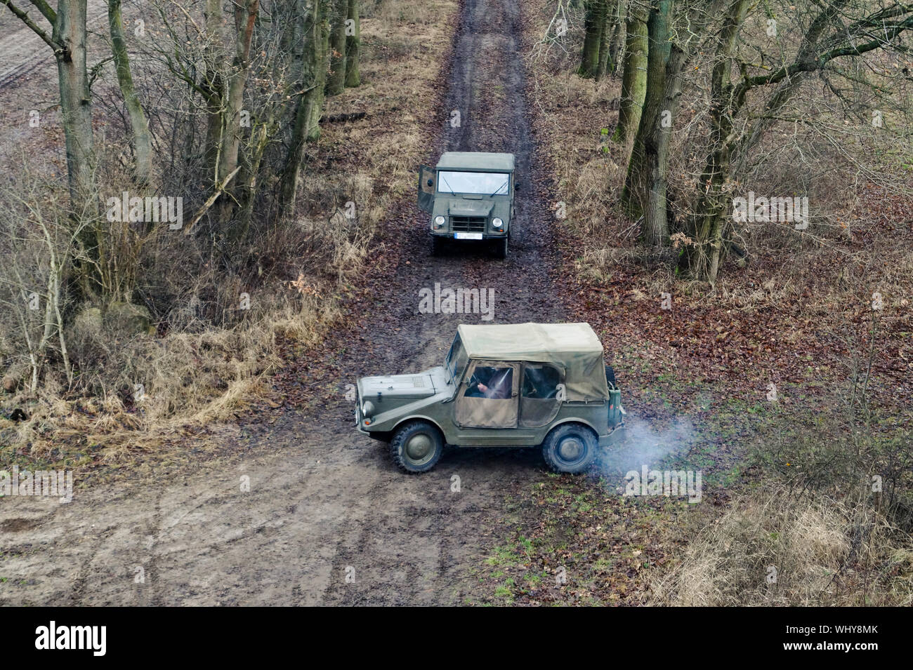 High Angle View Of Off-road Vehicles In Forest Stock Photo