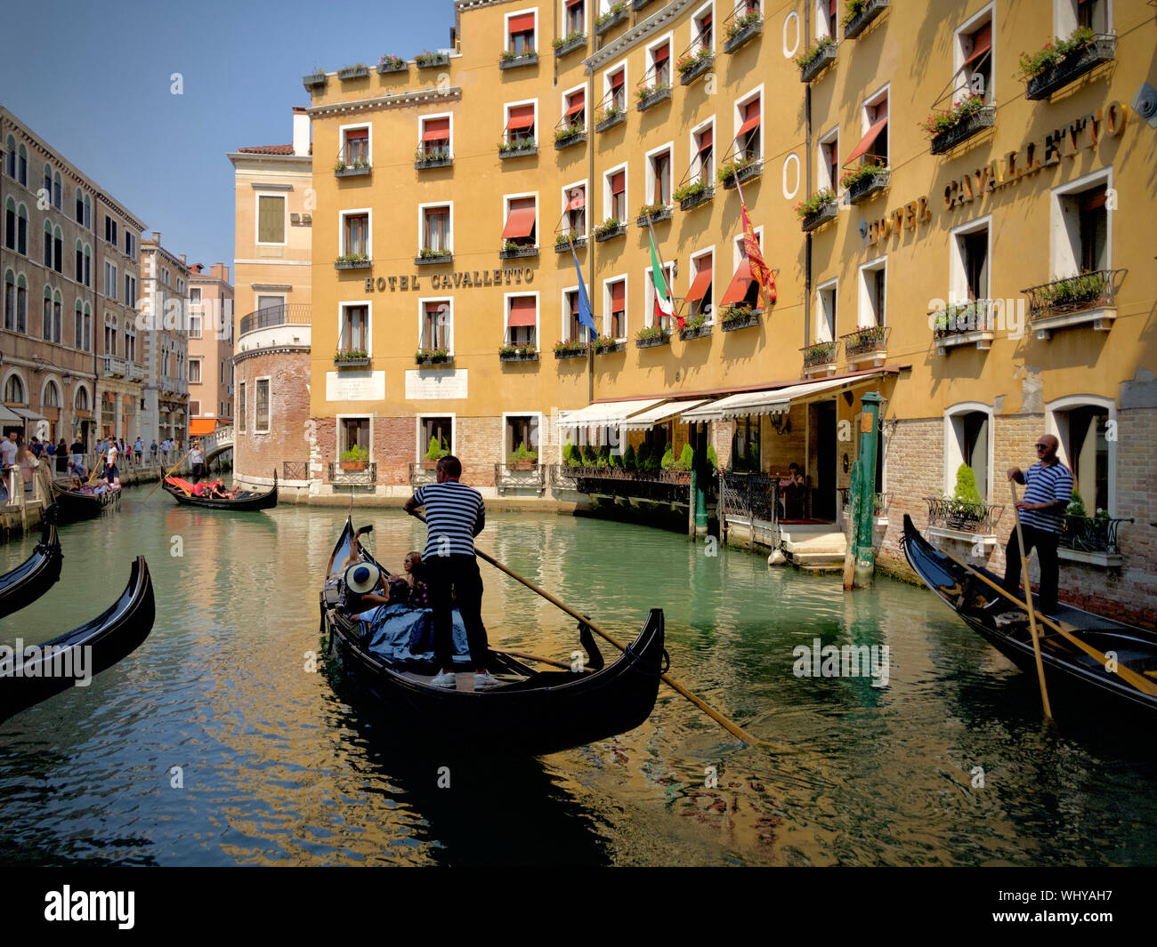 Gondaliers and gondolas in Venice, Italy Stock Photo