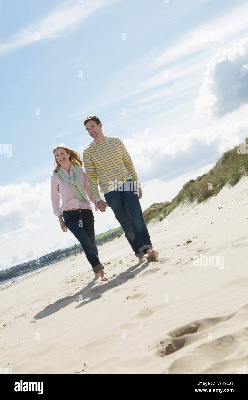 Women walking on beach scotland hi-res stock photography and images - Alamy