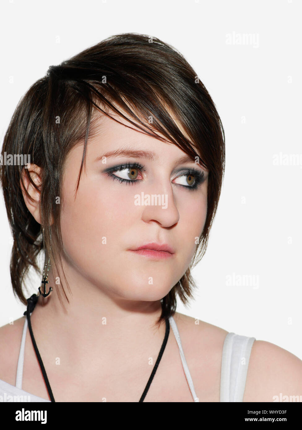 Closeup Of Serious Young Woman With Straight Short Hair
