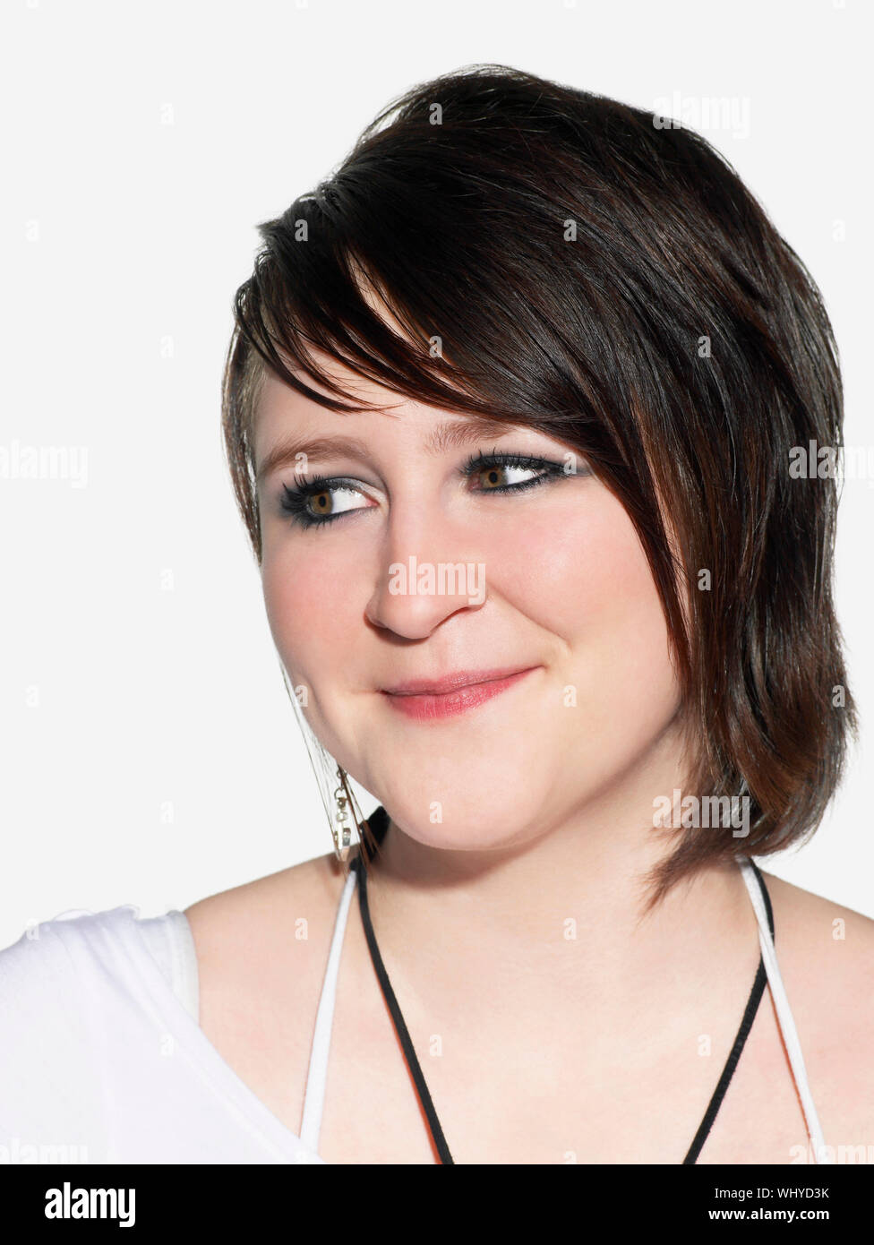 Closeup Of Beautiful Young Woman With Straight Short Hair