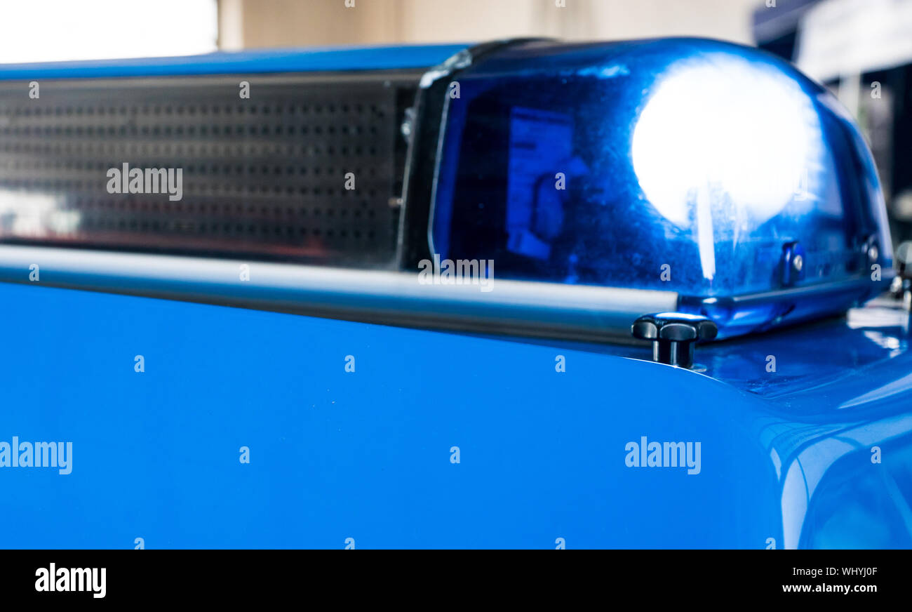 Blue light police car hires stock photography and images Alamy