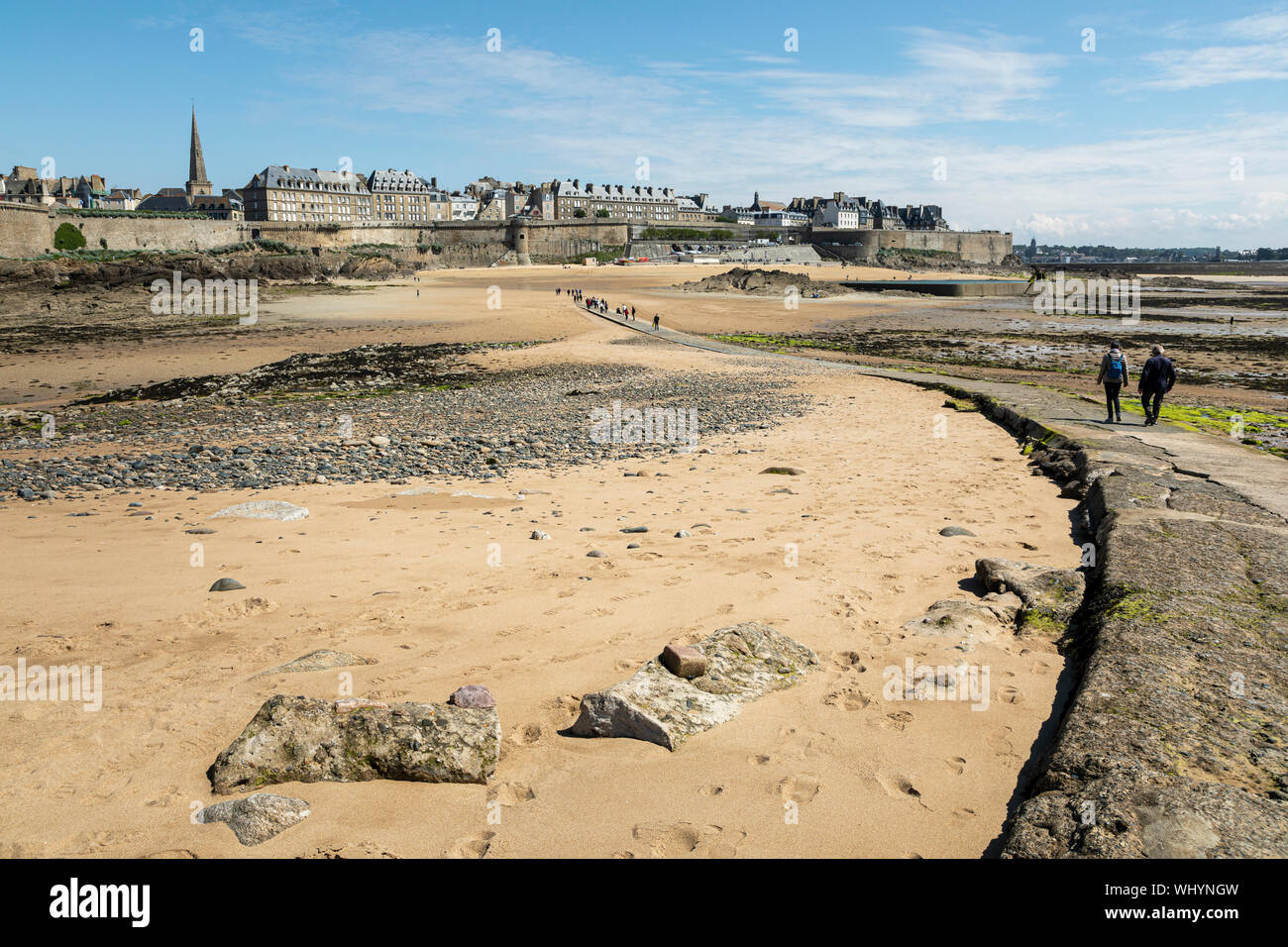 Looking back across the causeway at low tide from Grand Bé to St Malo, Brittany, France Stock Photo