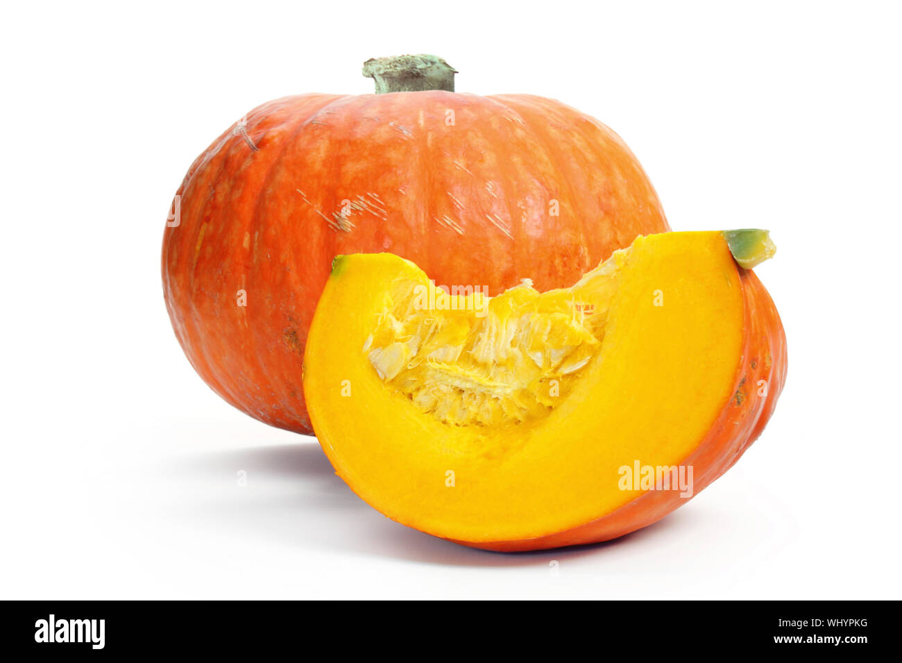 Slice of a pumpkin, isolated over a white background. Stock Photo