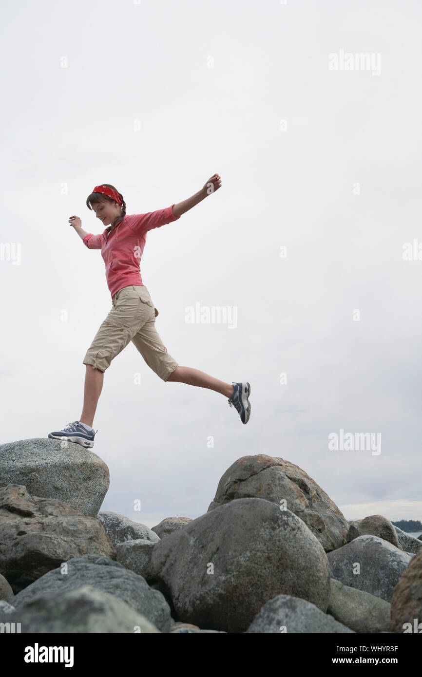 Leap Over Rocks Leaping over rocks hi-res stock photography and images - Alamy