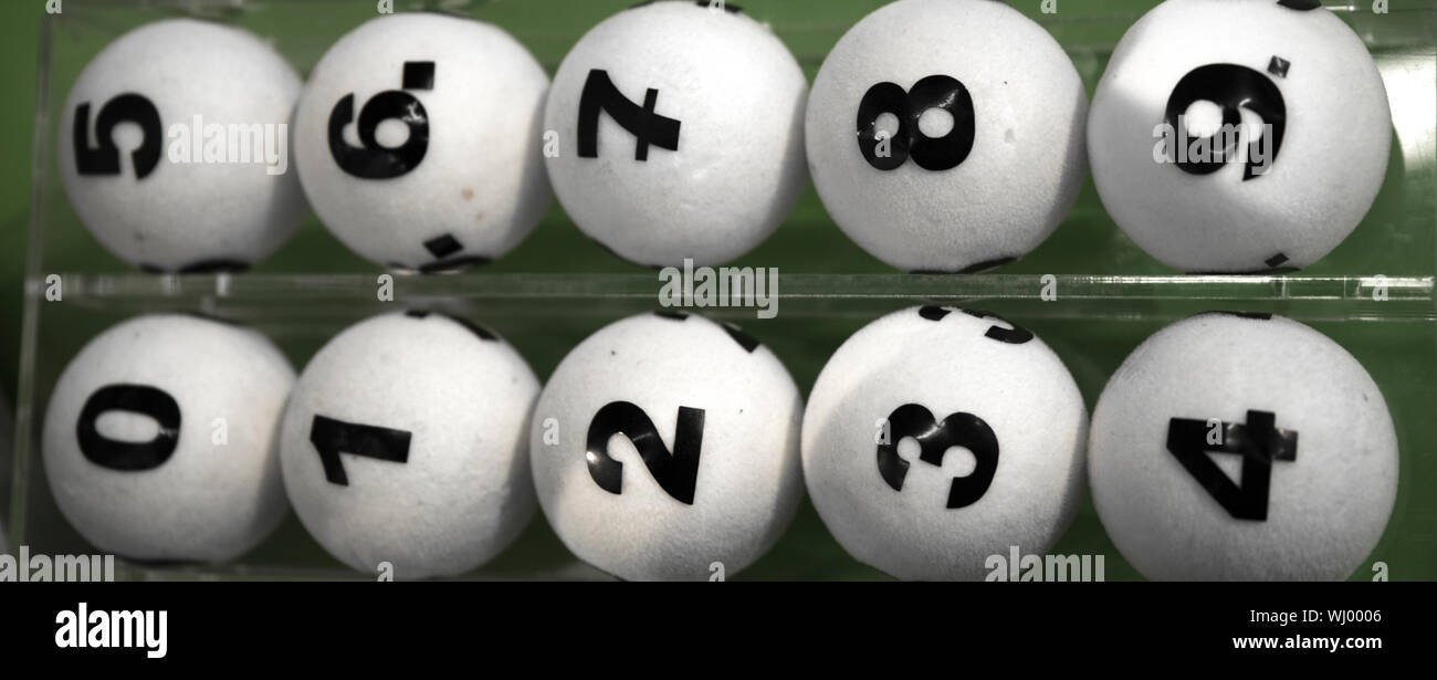 white balls with numbers for the game of lottery Stock Photo Alamy