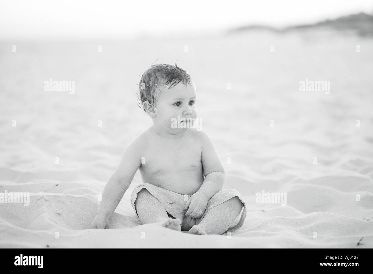 Baby boy sitting on hi-res stock photography and images - Alamy
