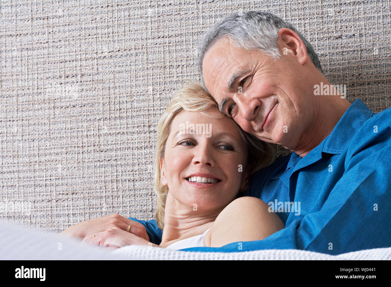 Two middle aged men hugging hi-res stock photography and images - Alamy