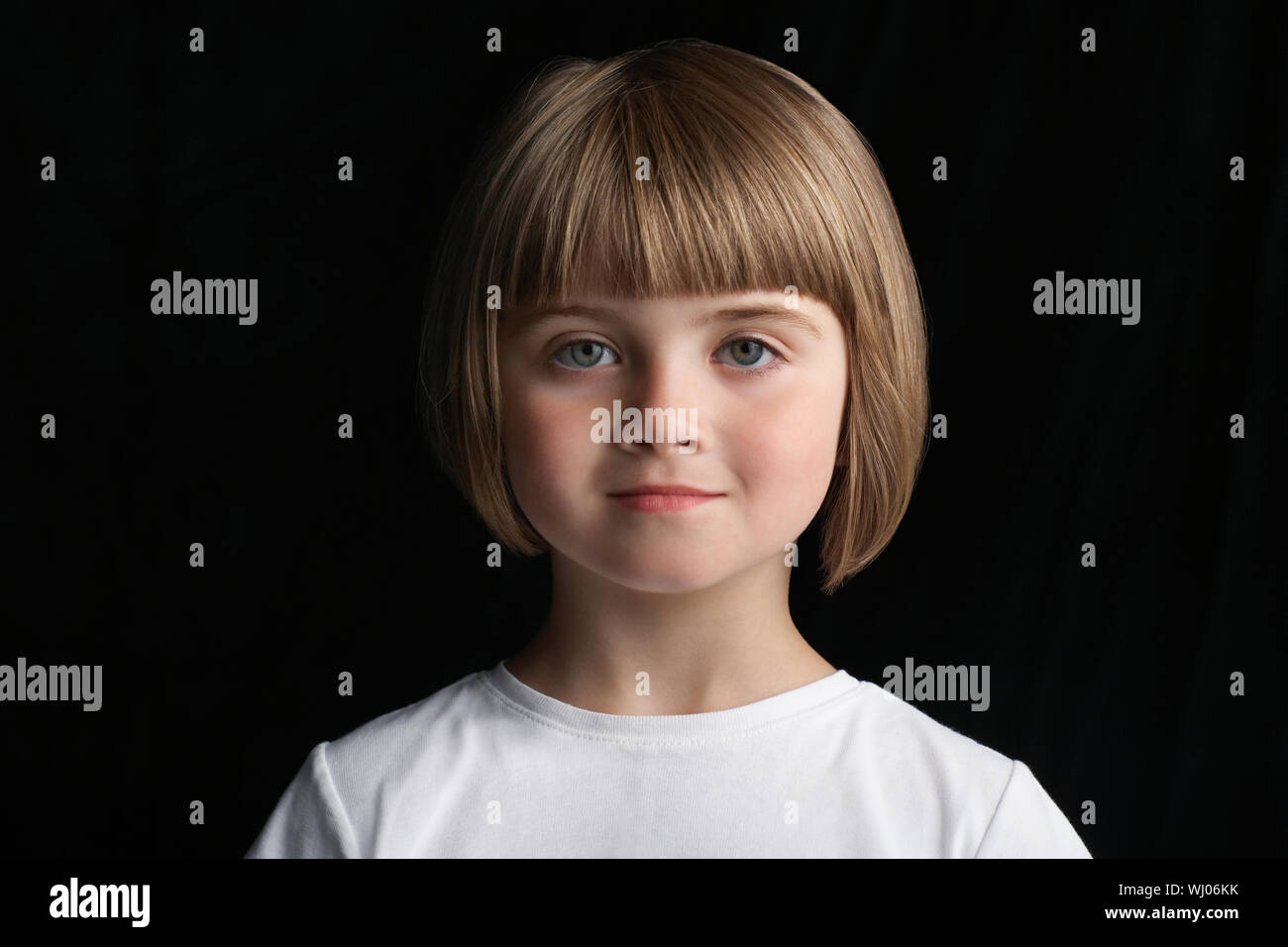 Closeup Portrait Of Cute Little Girl With Short Hair