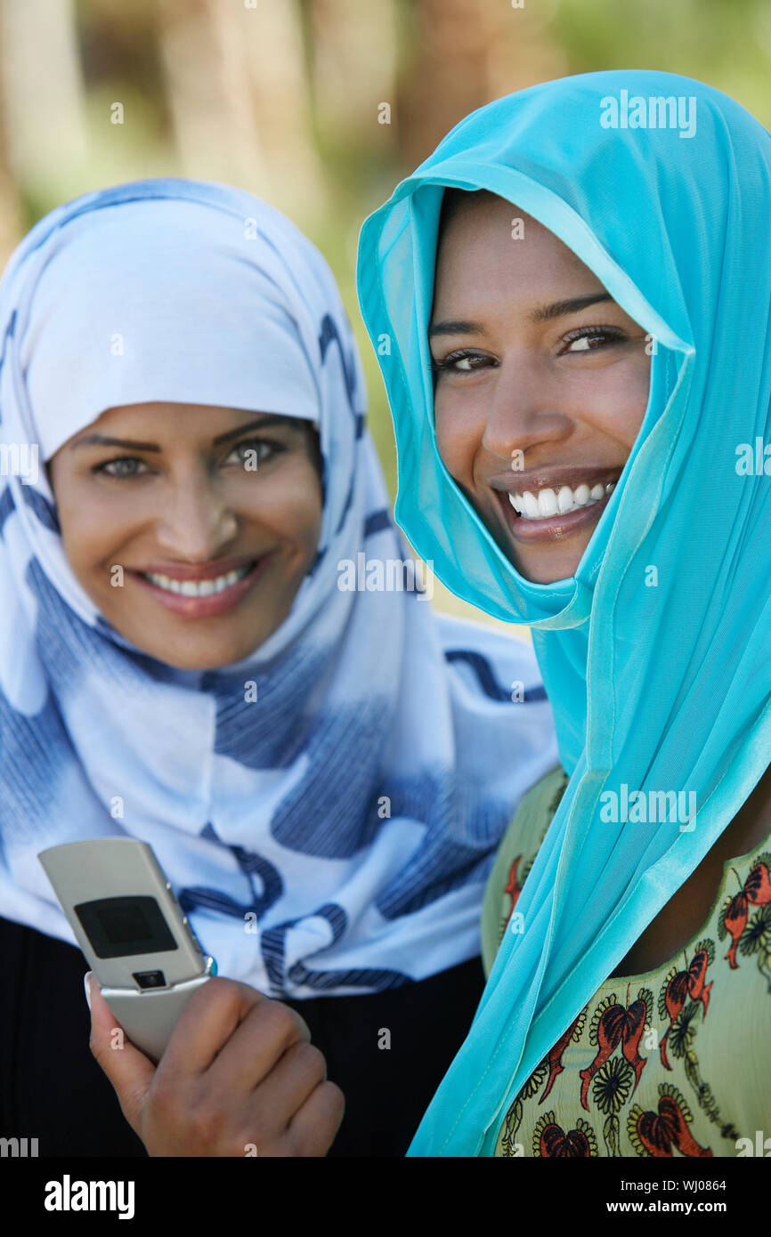 Portrait of two women in headscarfs Stock Photo