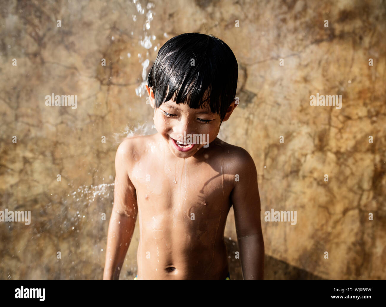 Young boy showering hires stock photography and images Alamy