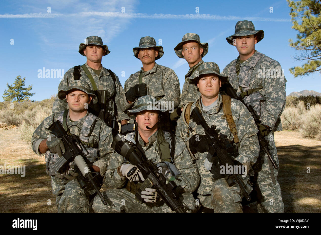 Group portrait of soldiers on field Stock Photo