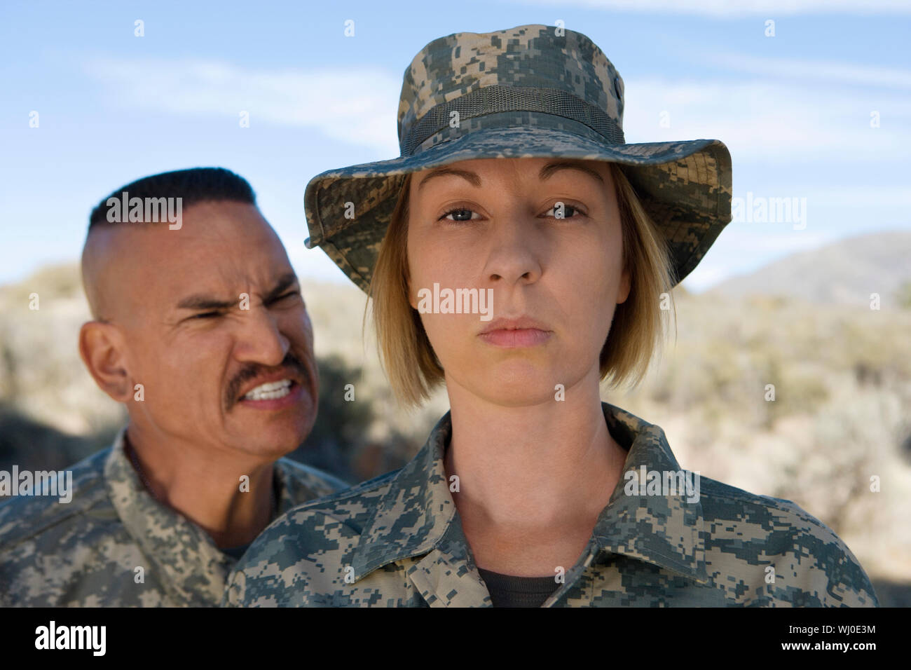 Portrait of female soldier and commander Stock Photo - Alamy