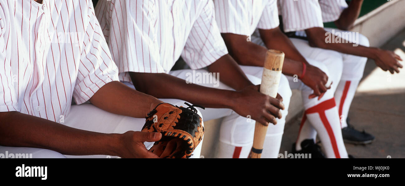 Baseball players sitting in dugout hires stock photography and images Alamy