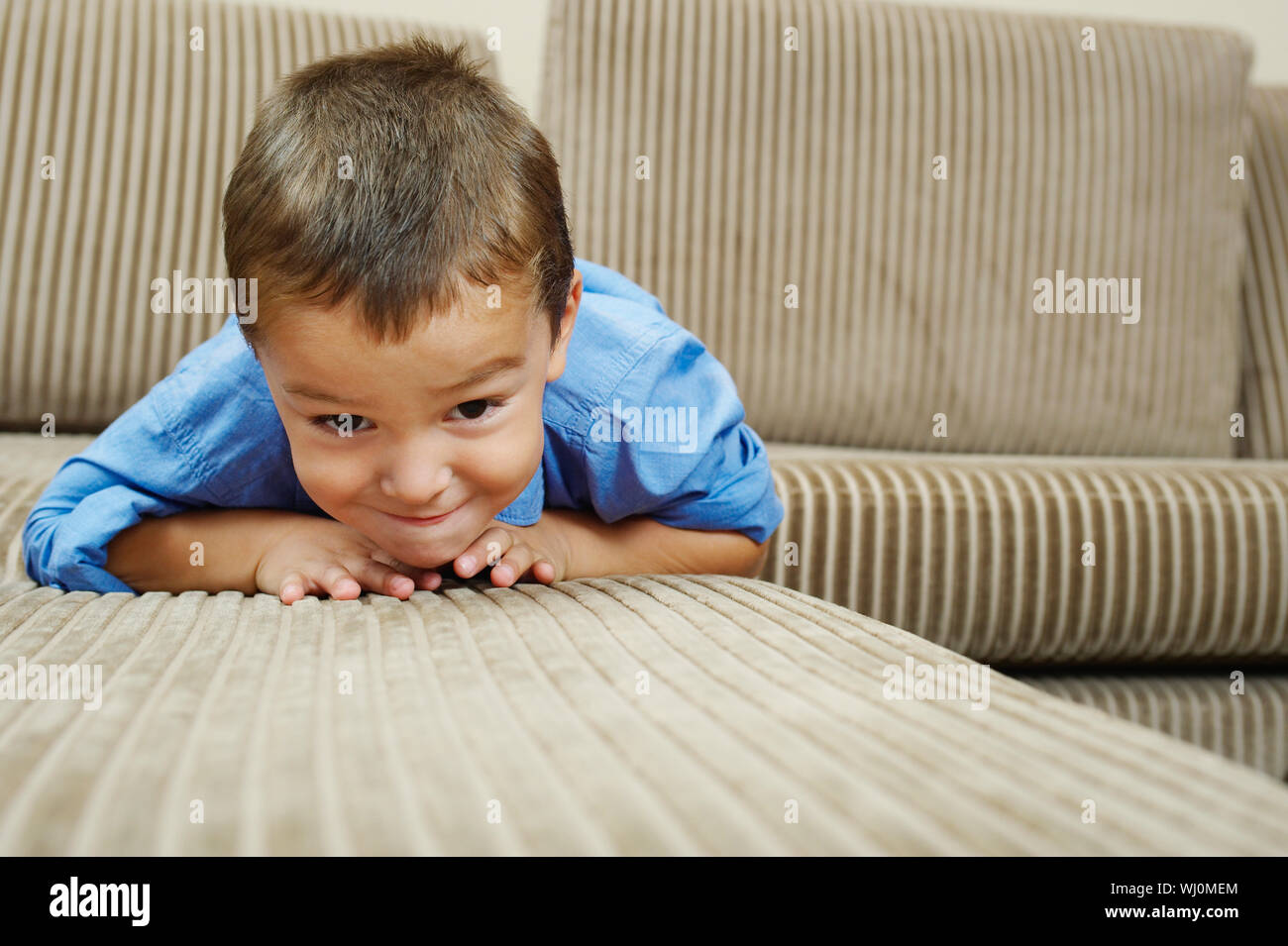 Teen boy relaxing sofa hi-res stock photography and images - Alamy