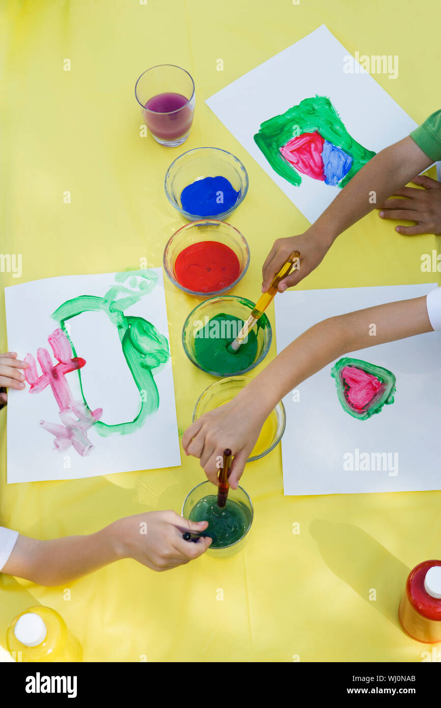 Children paint brush high view hi-res stock photography and images - Alamy