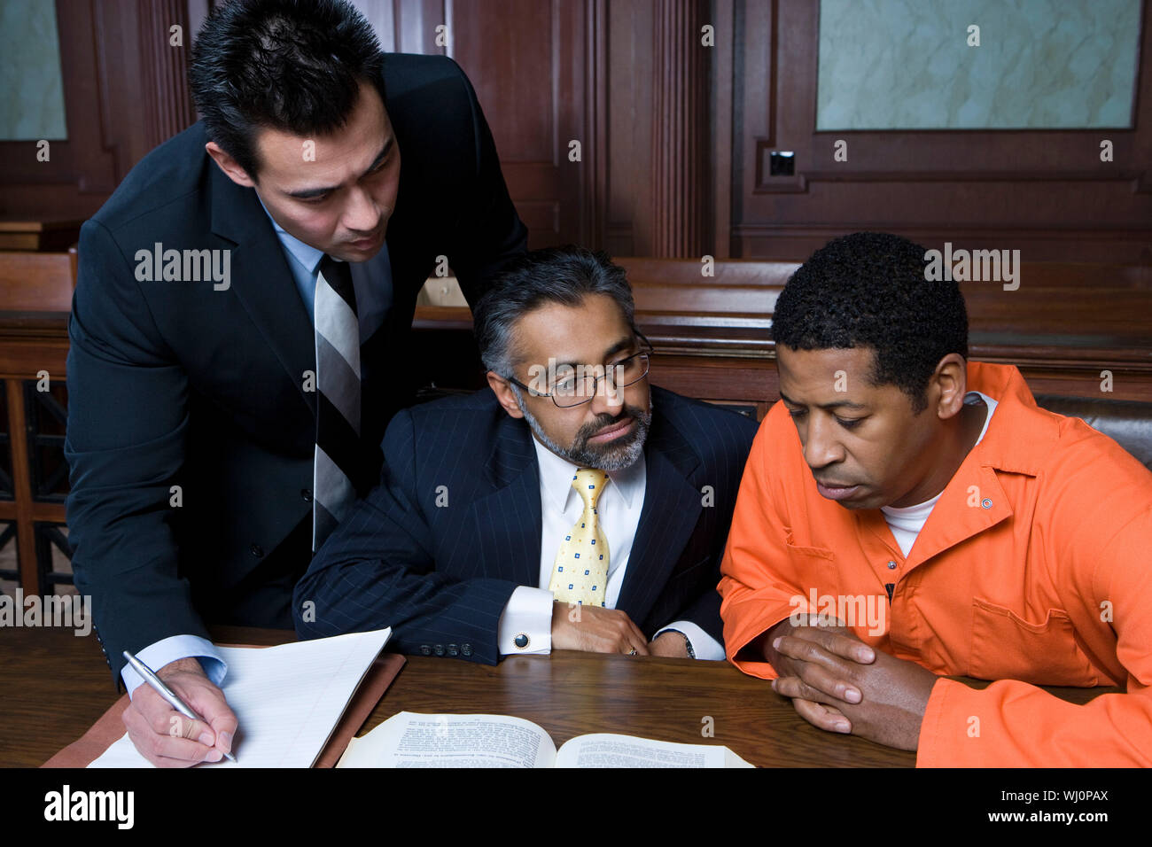 Criminal with two lawyers in court Stock Photo: 8 ...
