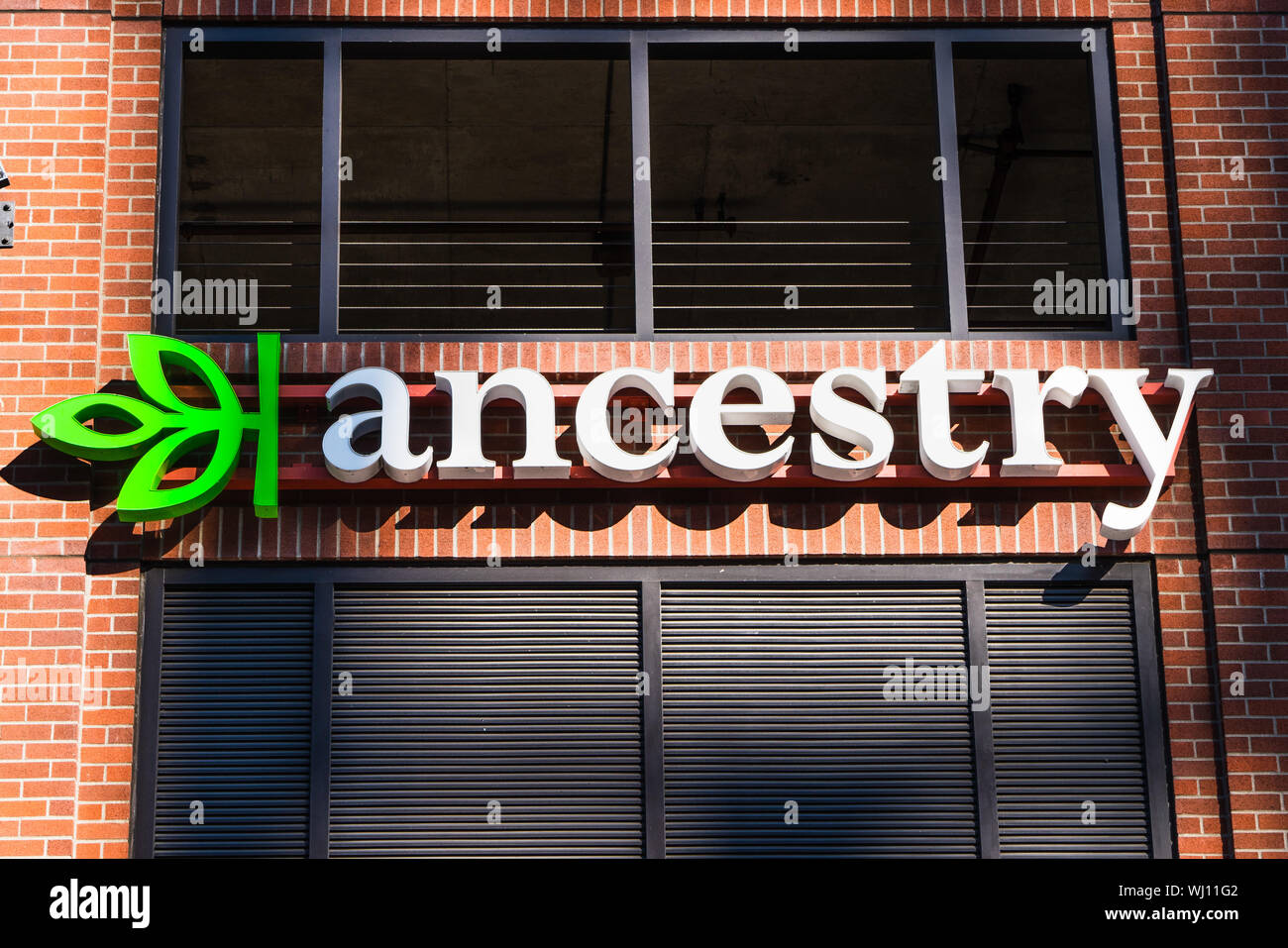 August 21, 2019 San Francisco / CA / USA - Close up of Ancestry sign at their HQ in SOMA district; Ancestry.com LLC operates a network of genealogical Stock Photo