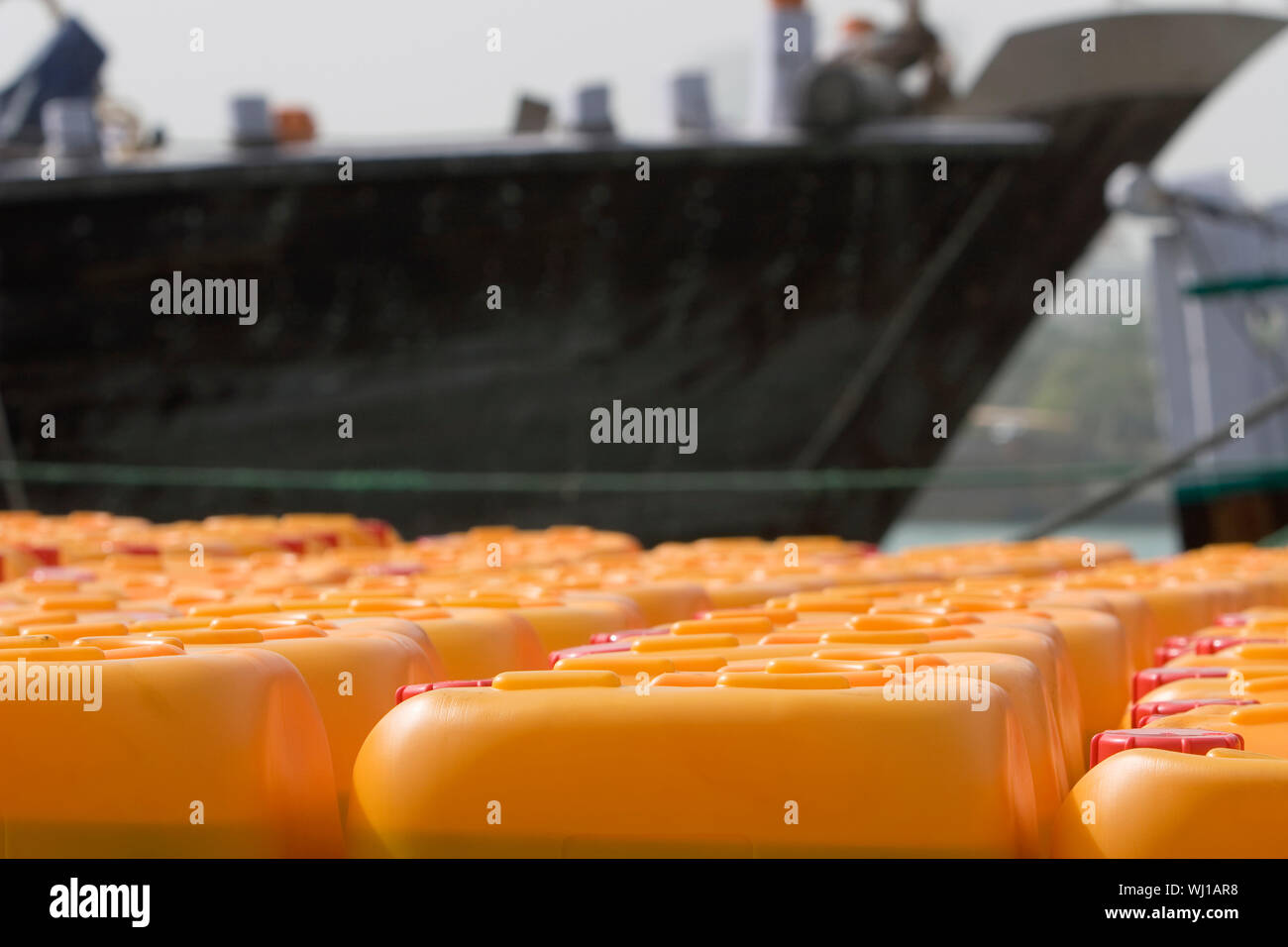 Dubai, UAE, Cooking oil waits to be loaded aboard a dhow headed for