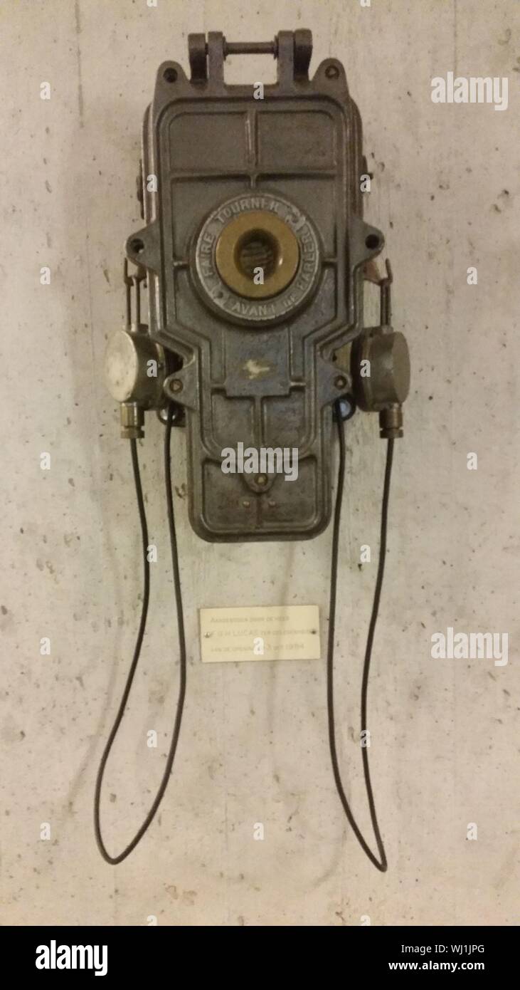 Old telephone mounted on wall hi-res stock photography and images - Alamy