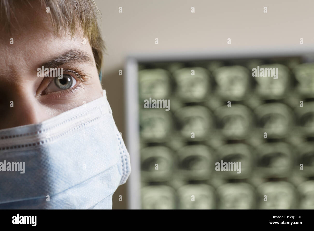 Closeup of a female doctor wearing surgical mask Stock Photo - Alamy