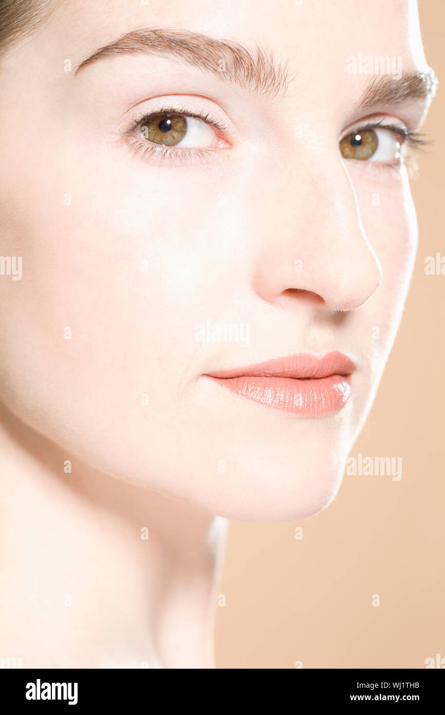 Beautiful face of a young adult woman with clean fresh skin Stock Photo ...