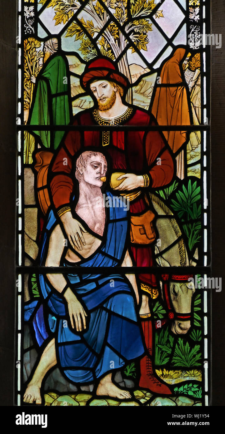 North nave window (detail). The Good Samaritan. Church of Saint James, Staveley, Lake District National Park, Cumbria, England, United Kingdom, Europe Stock Photo