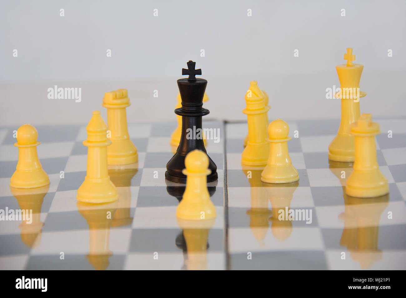 In chess, why are the black and white king / queens opposite each