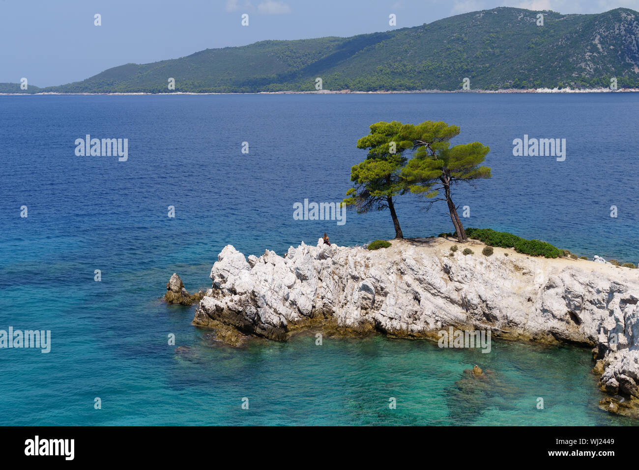 Amarandos Cape ( Amaranths Cape) under the full light of sun. One of the most beautiful places in Skopelos Stock Photo