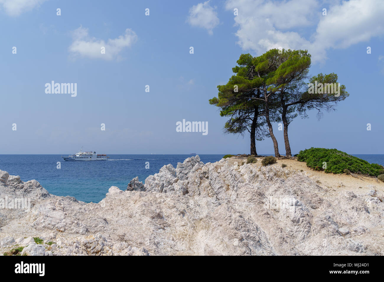 Amarandos Cape ( Amaranths Cape) under the full light of sun. One of the most beautiful places in Skopelos Stock Photo