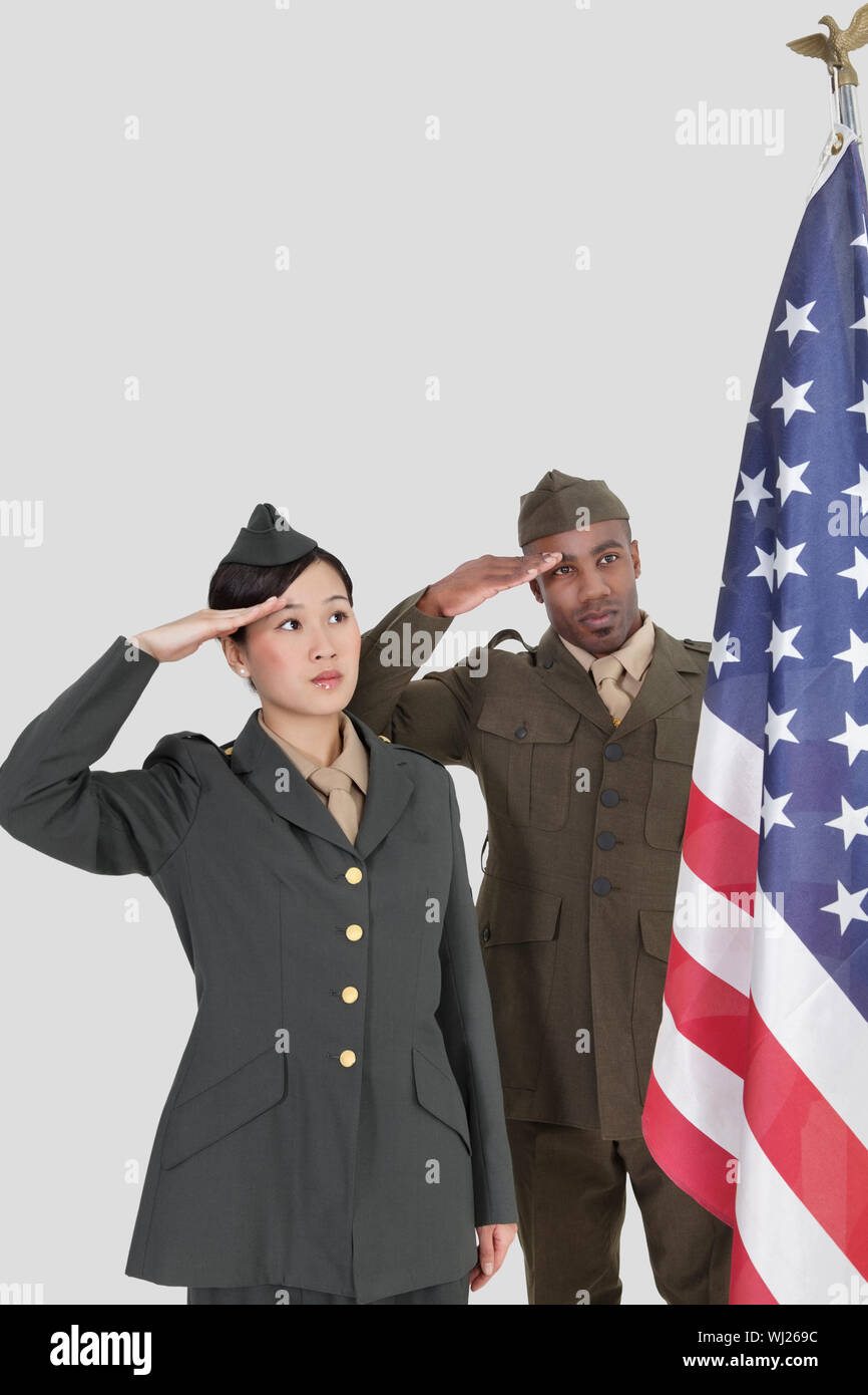 American female soldier saluting flag hires stock photography and