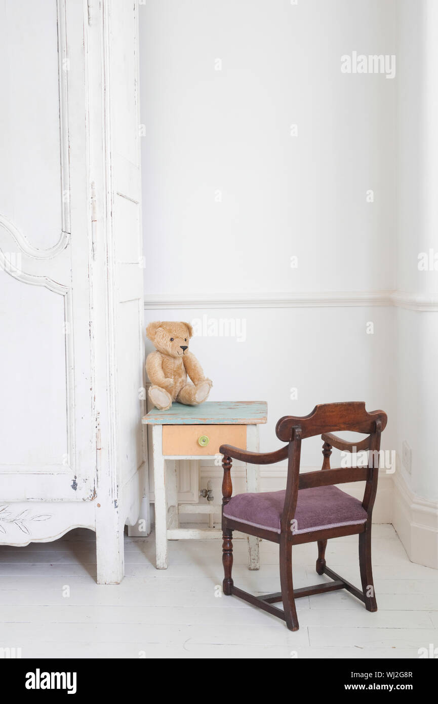 View Of Teddy Bear On Child S Study Table By Wardrobe Stock Photo