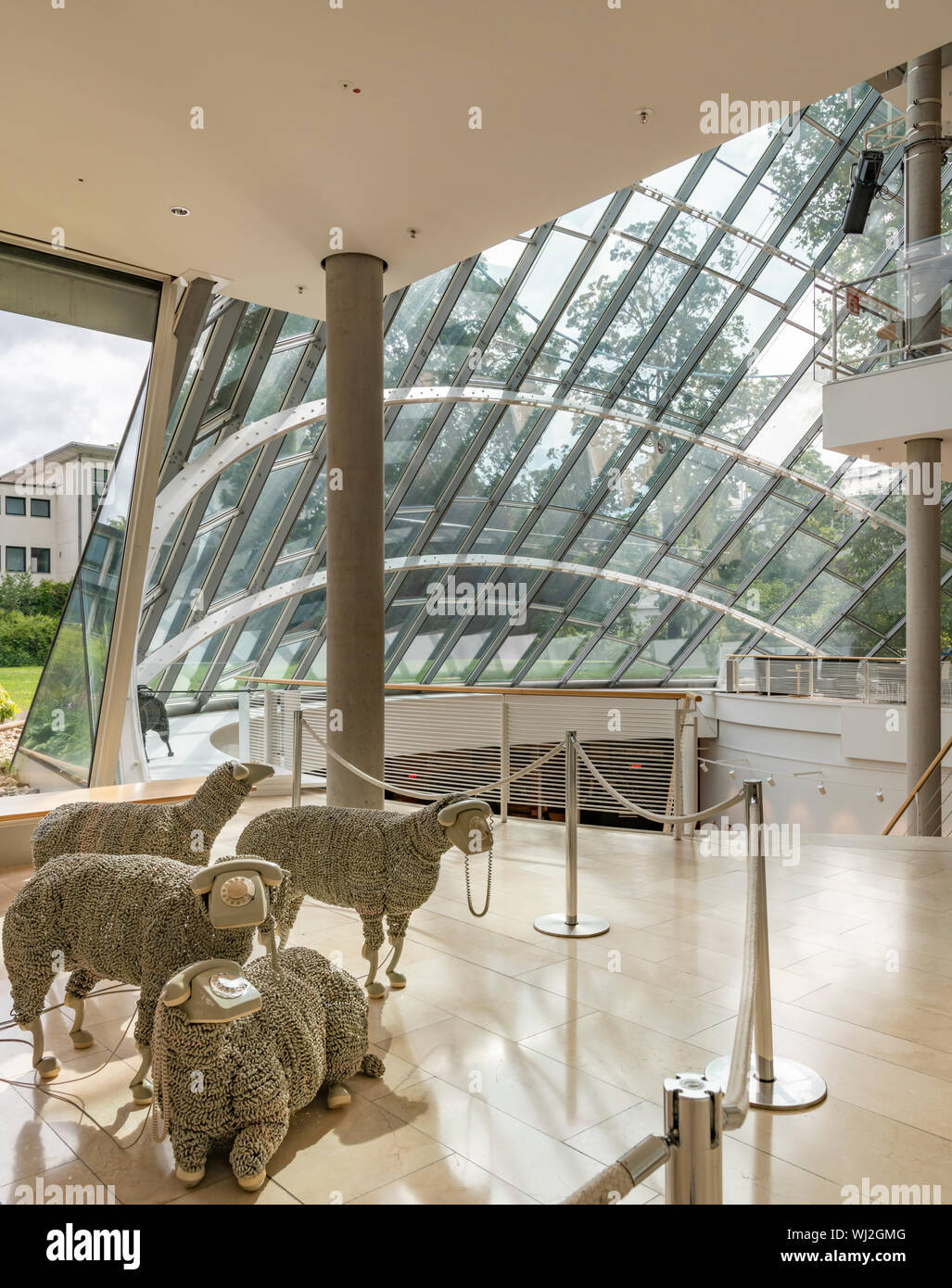 Museum for Communication, Frankfurt. Designed by architect Günter Behnisch  and opened in 1990. The Sheep Telephones are by Jean Luc Cornec Stock Photo  - Alamy