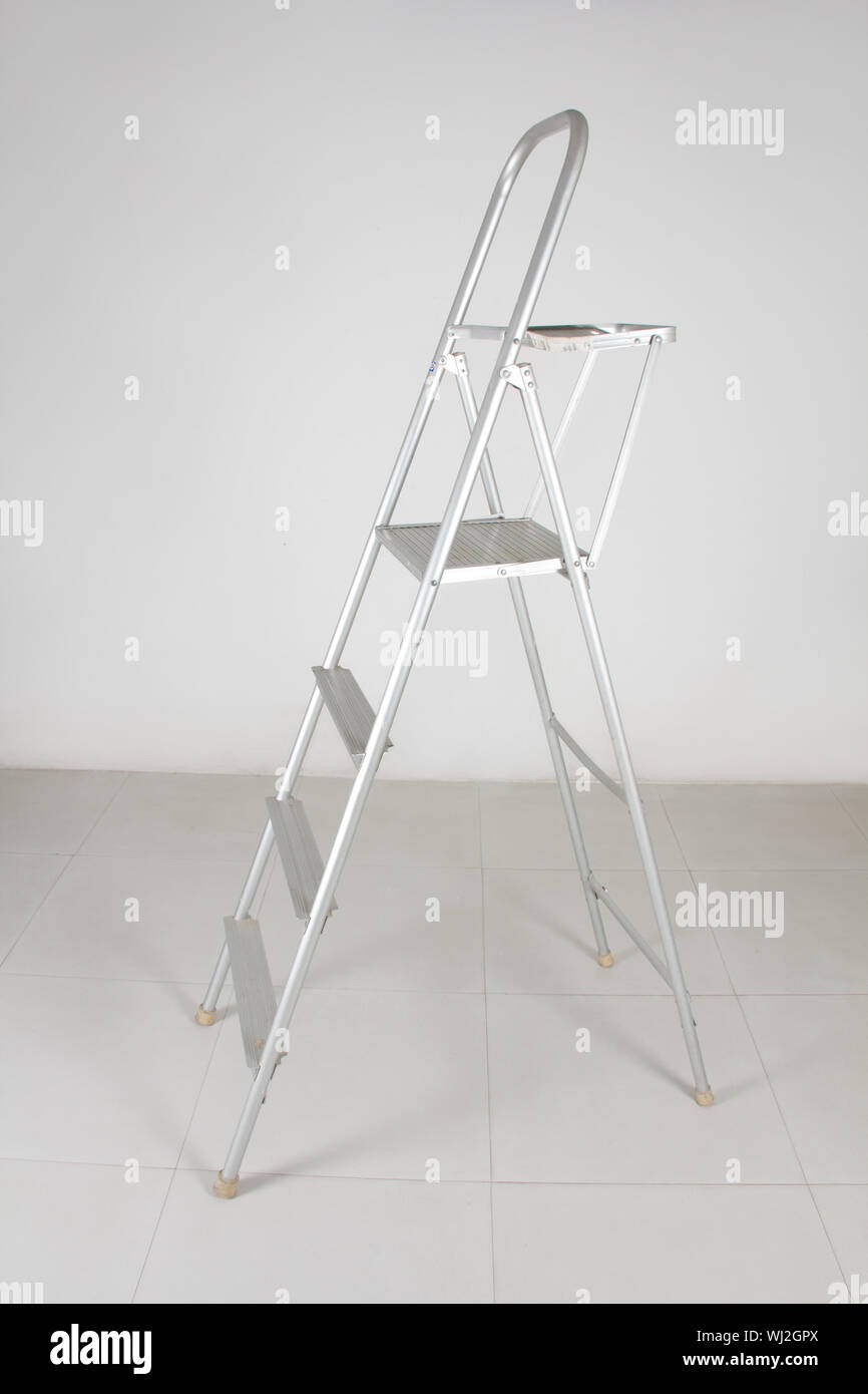 Empty foldable step ladder Stock Photo