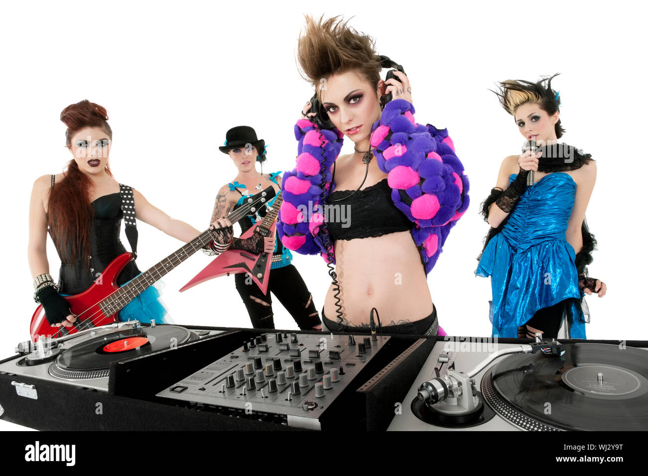 Portrait of all female punk rock band over white background Stock Photo