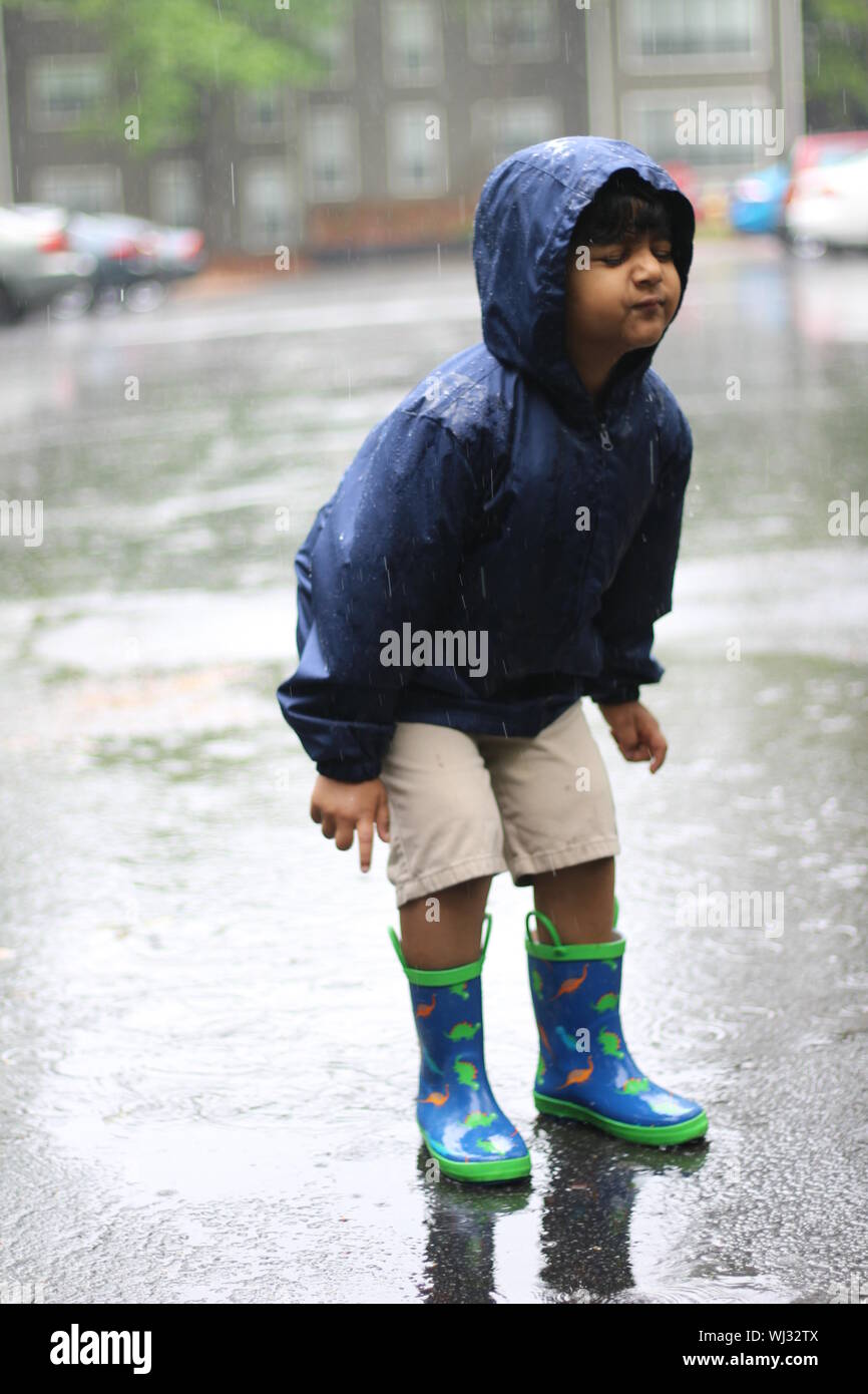 Boy Wearing Raincoat Standing 