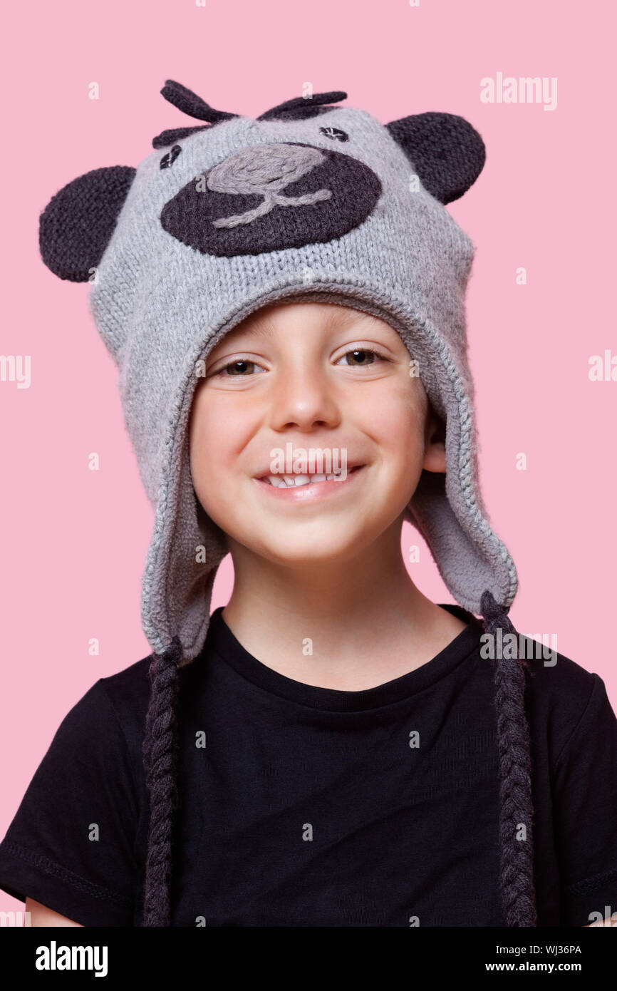 Portrait of a happy young boy wearing 