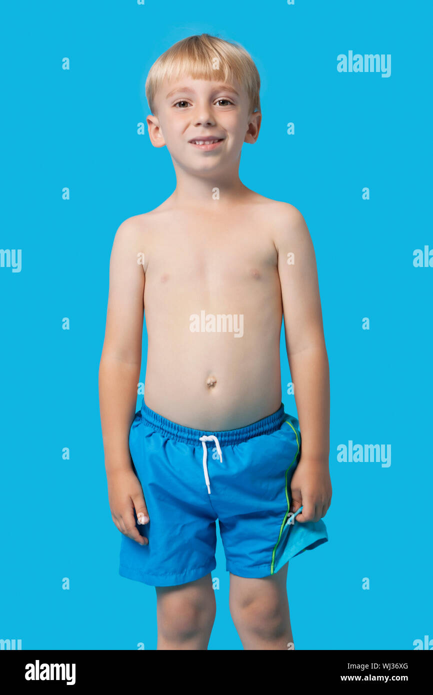 boy in swimming trunks