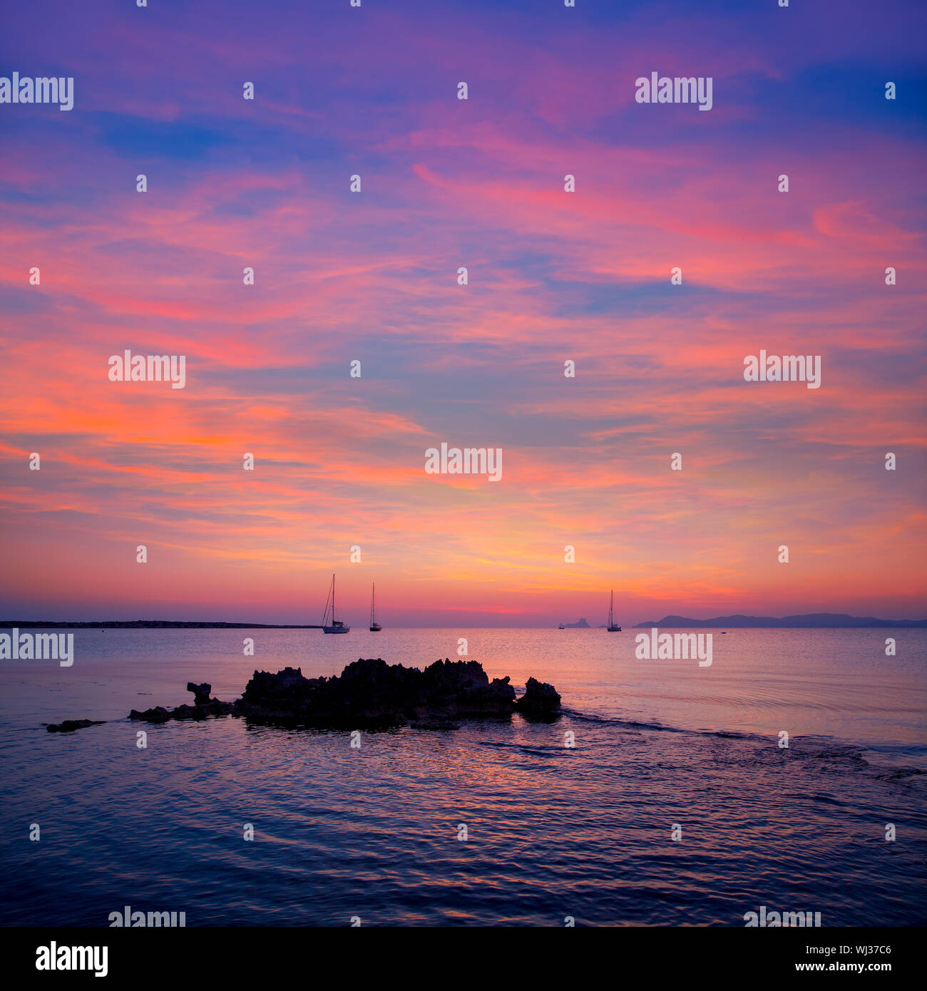 Ibiza Sunset View From Formentera Island With Sailboat In Balearic Islands Stock Photo Alamy alamy