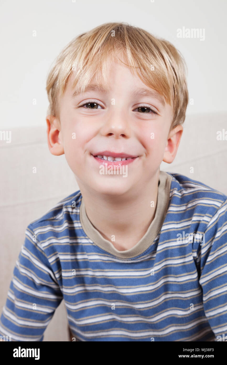 Close-up portrait of cute young boy smiling Stock Photo - Alamy