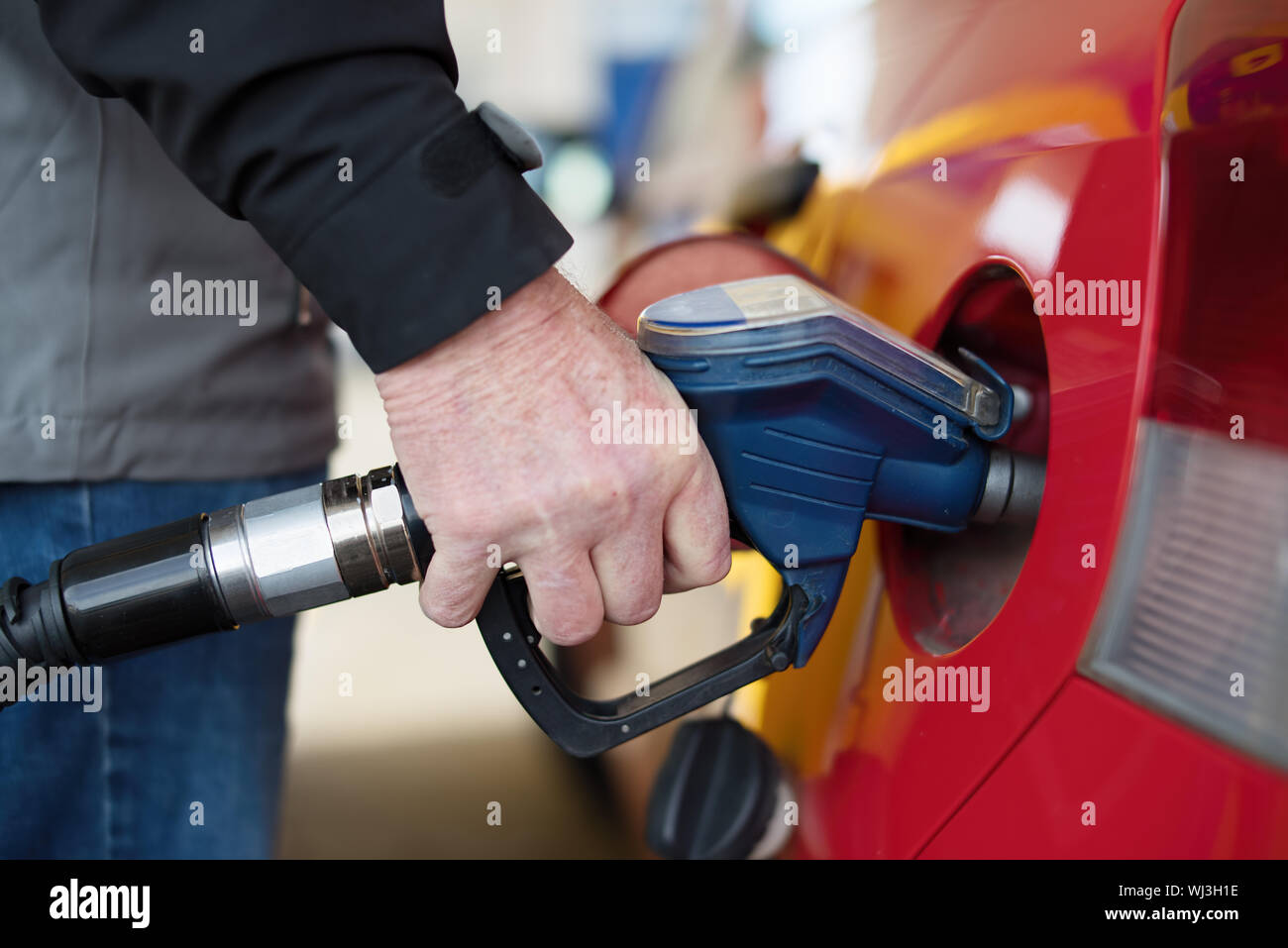 Close-up Of Refueling Car Stock Photo