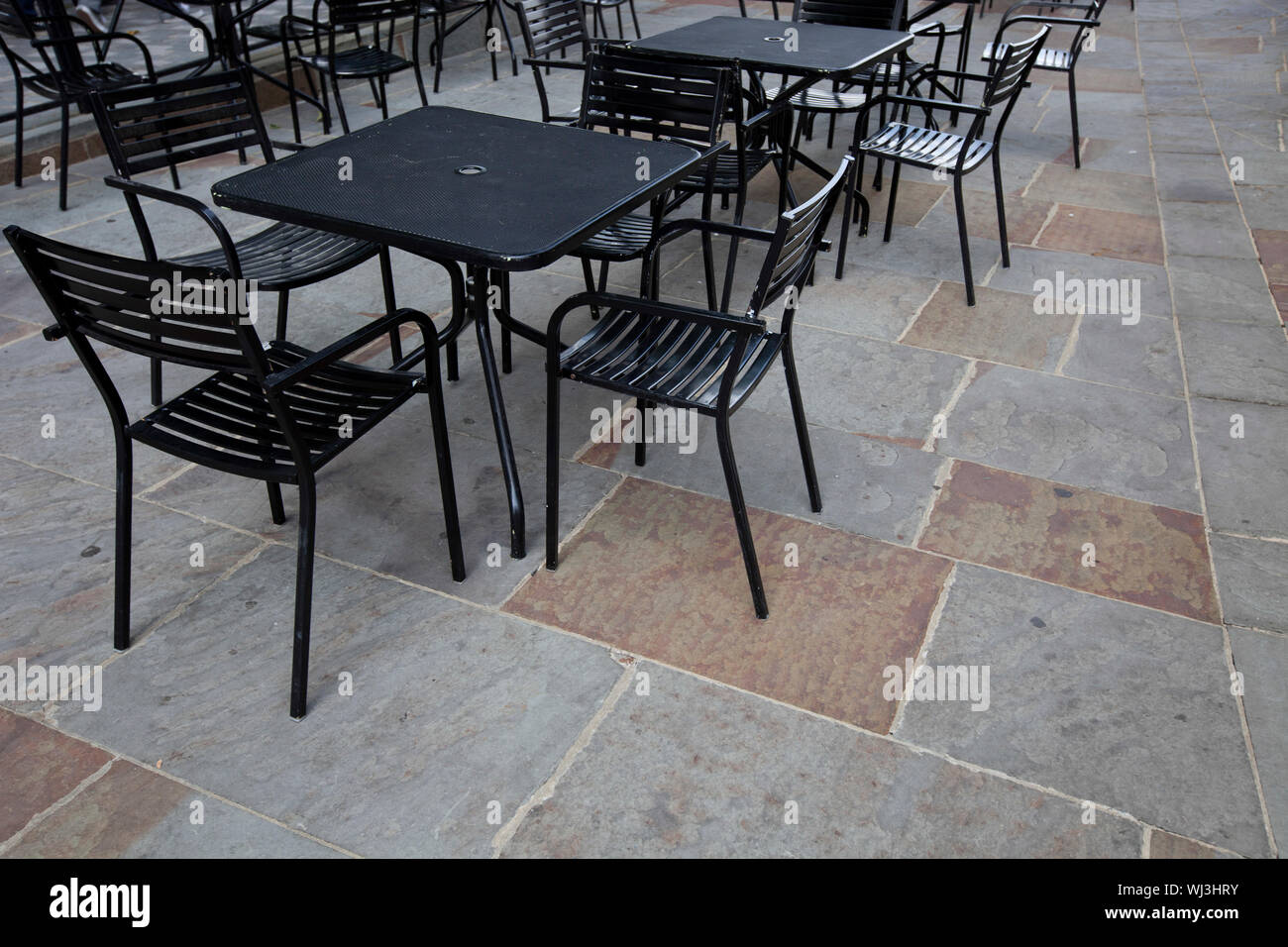 Tables and chairs at outdoor cafe Stock Photo Alamy
