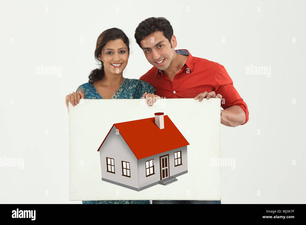 Young couple showing his dream home Stock Photo - Alamy