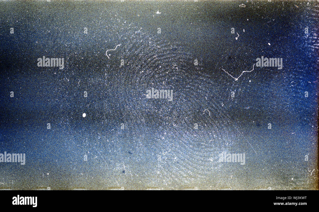 Blank grained film strip texture background with heavy grain, dust fingerprint and newton's rings Stock Photo