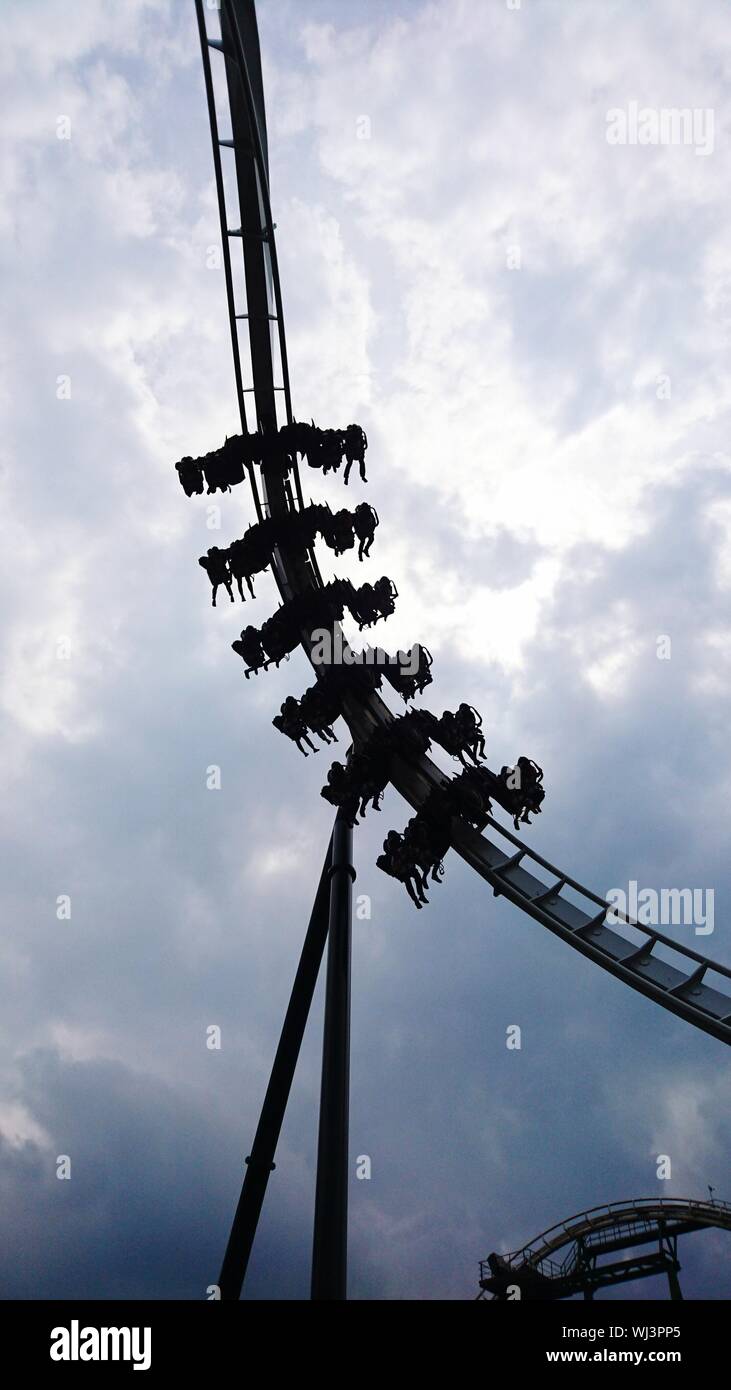 Low Angle View Of Amusement Ride Stock Photo