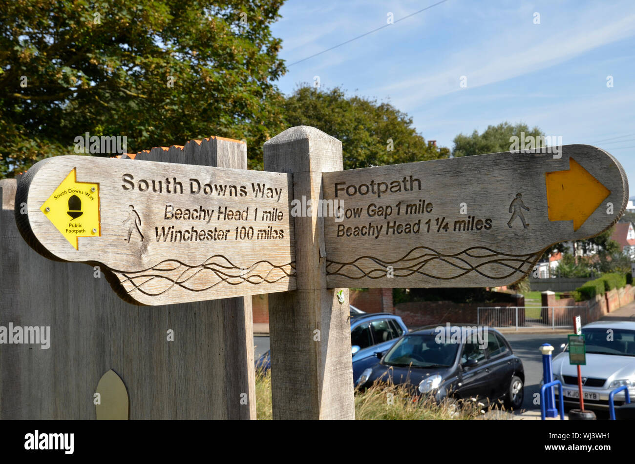 A sign at the beginning of the South Downs Way near Eastbourne in East Sussex. The footpaths run for 100 miles across national parks to Winchester. Stock Photo