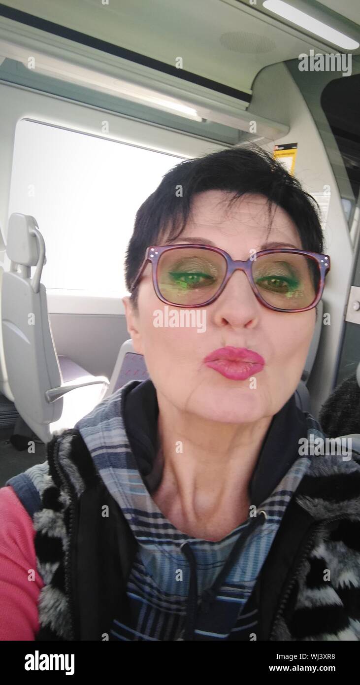 Mature woman travel train hi-res stock photography and images - Alamy