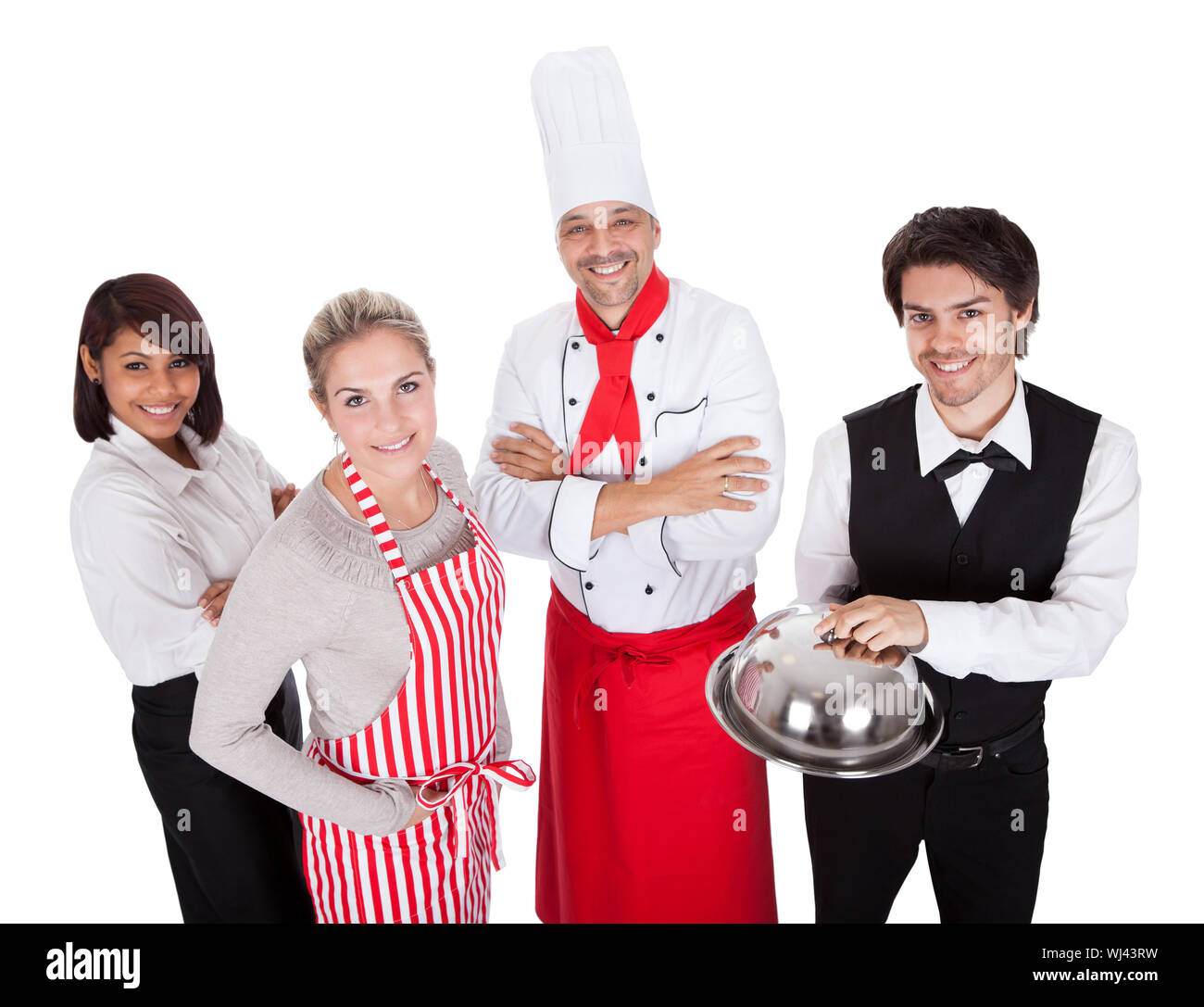 Group of restaurant chef and waiters. Isolated on white Stock Photo